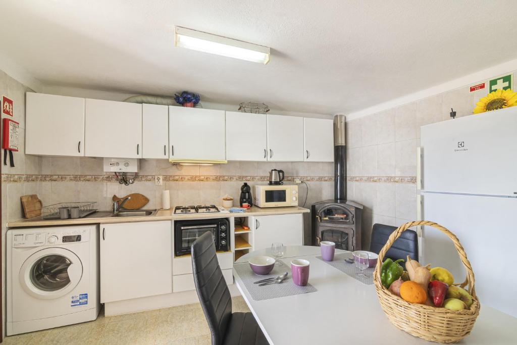 A cozinha ou kitchenette de Casa das Bonecas