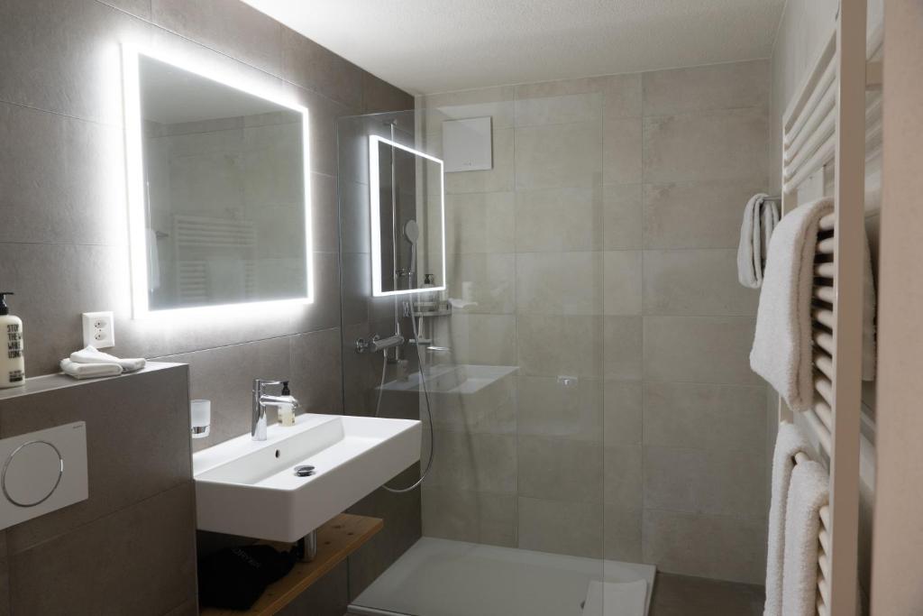 Koupelna v ubytování Hotel Alpenland