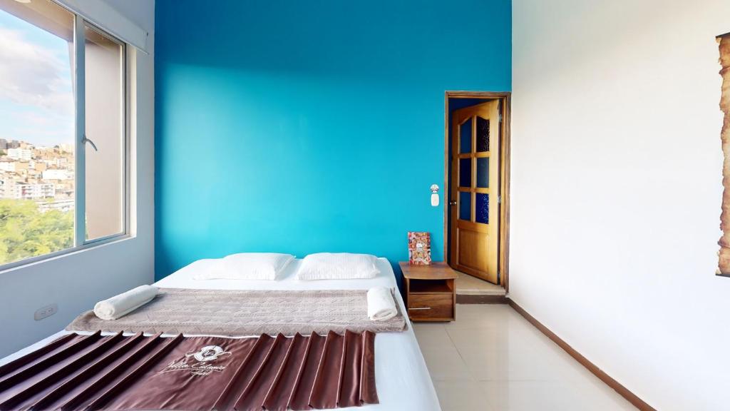Postel nebo postele na pokoji v ubytování Hotel Villa Colonia