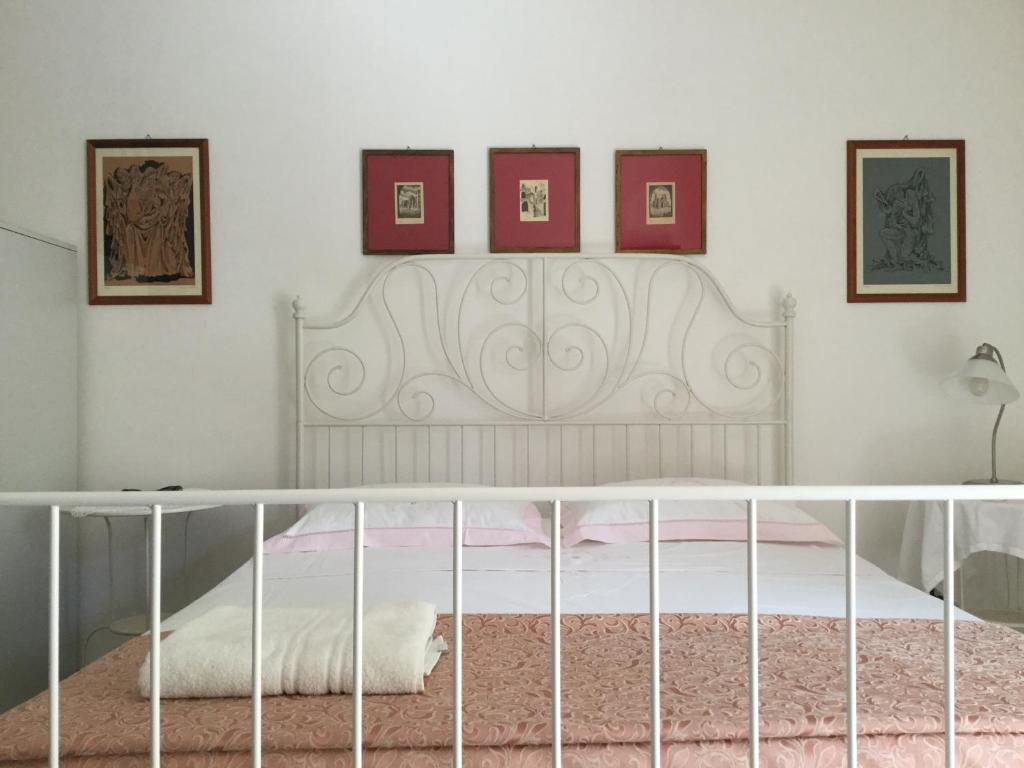 Postel nebo postele na pokoji v ubytování Dimora Gentile