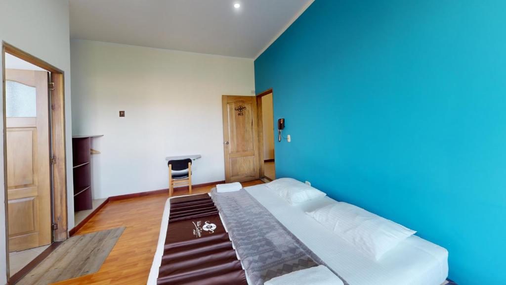 Postel nebo postele na pokoji v ubytování Hotel Villa Colonia