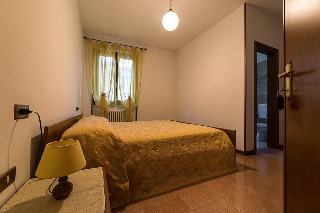 Postel nebo postele na pokoji v ubytování B&B Il Centrale