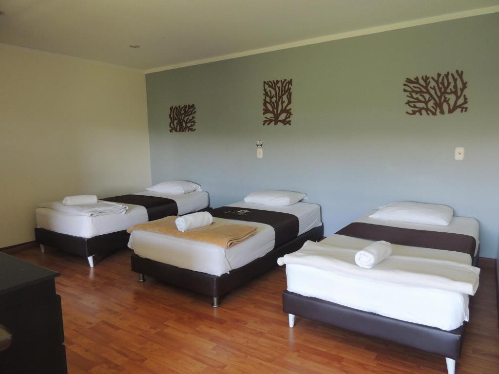 Postel nebo postele na pokoji v ubytování Hotel Villa Colonia