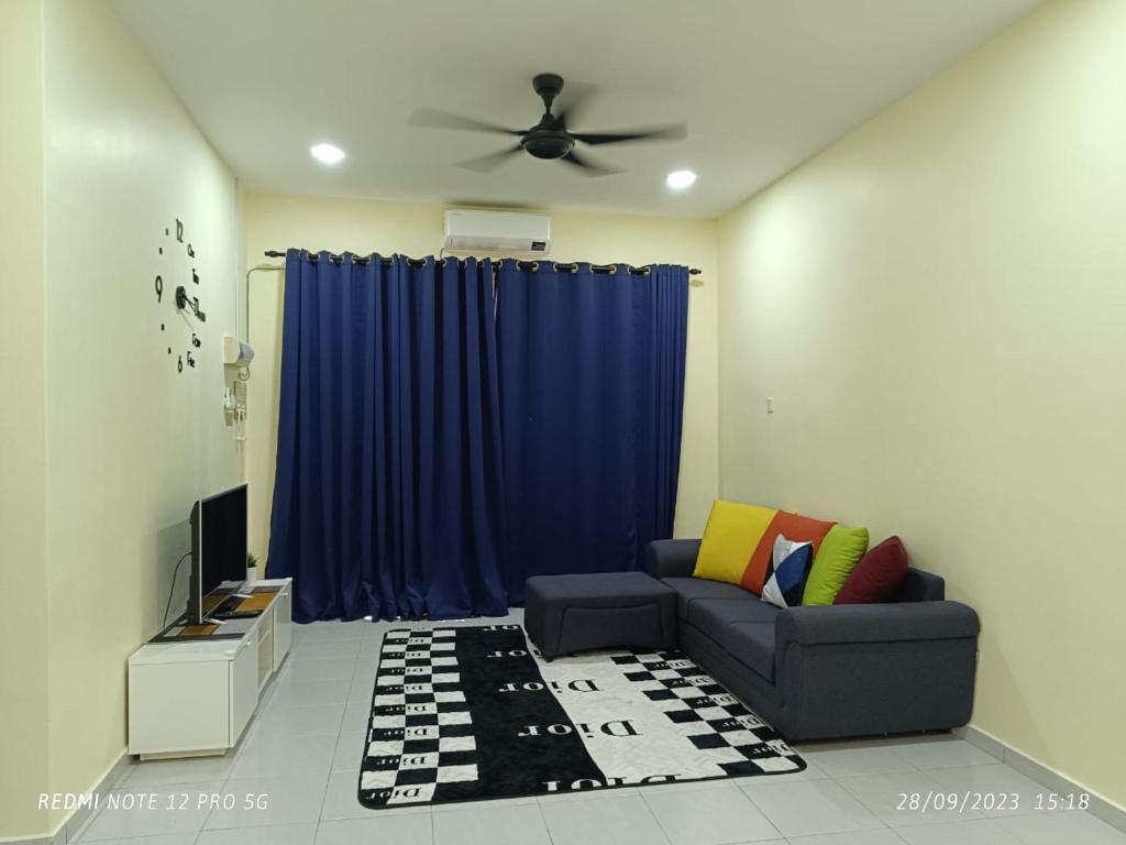 Μια τηλεόραση ή/και κέντρο ψυχαγωγίας στο Loving Homestay Pantai Sepat, Kuantan