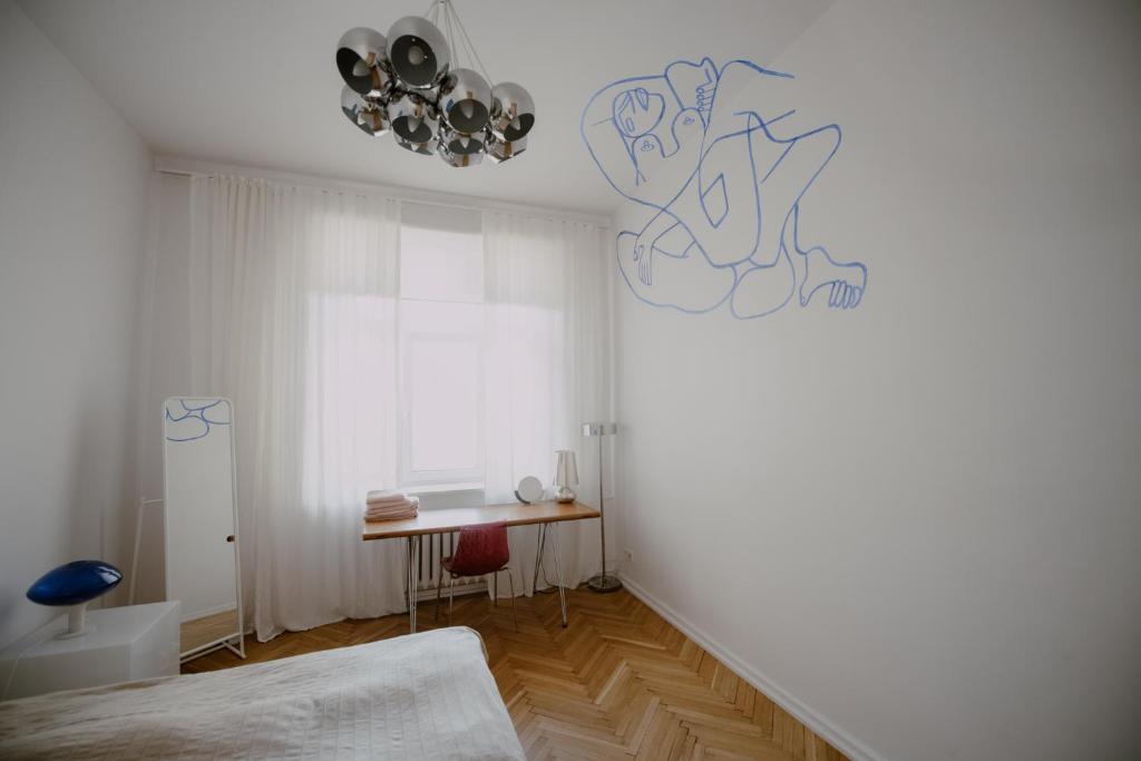 Posteľ alebo postele v izbe v ubytovaní Space Age Residence