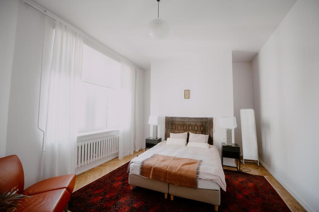 Posteľ alebo postele v izbe v ubytovaní Space Age Residence