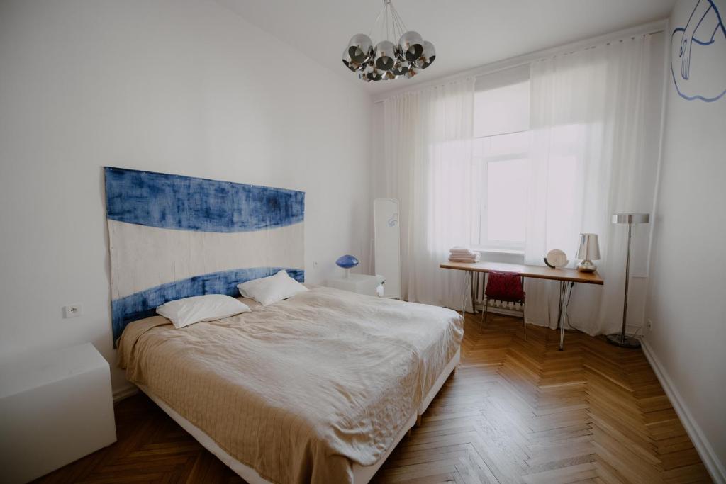Posteľ alebo postele v izbe v ubytovaní Space Age Residence