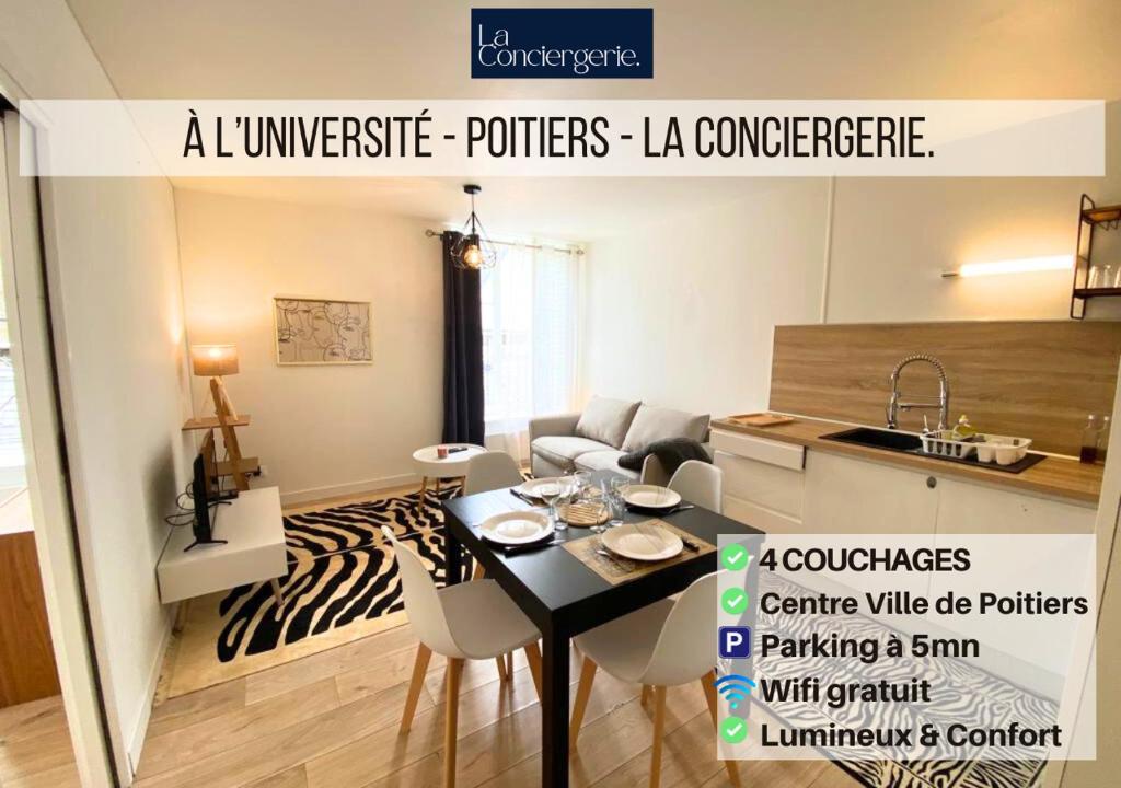 uma cozinha e uma sala de estar com mesa e cadeiras em A l'Université - Poitiers - La Conciergerie. em Poitiers