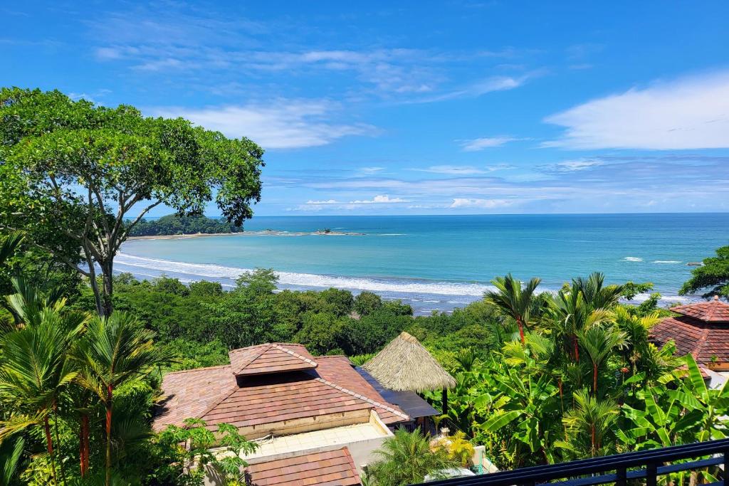 a view of the ocean from a resort at Canto Del Mar #13 in Dominical