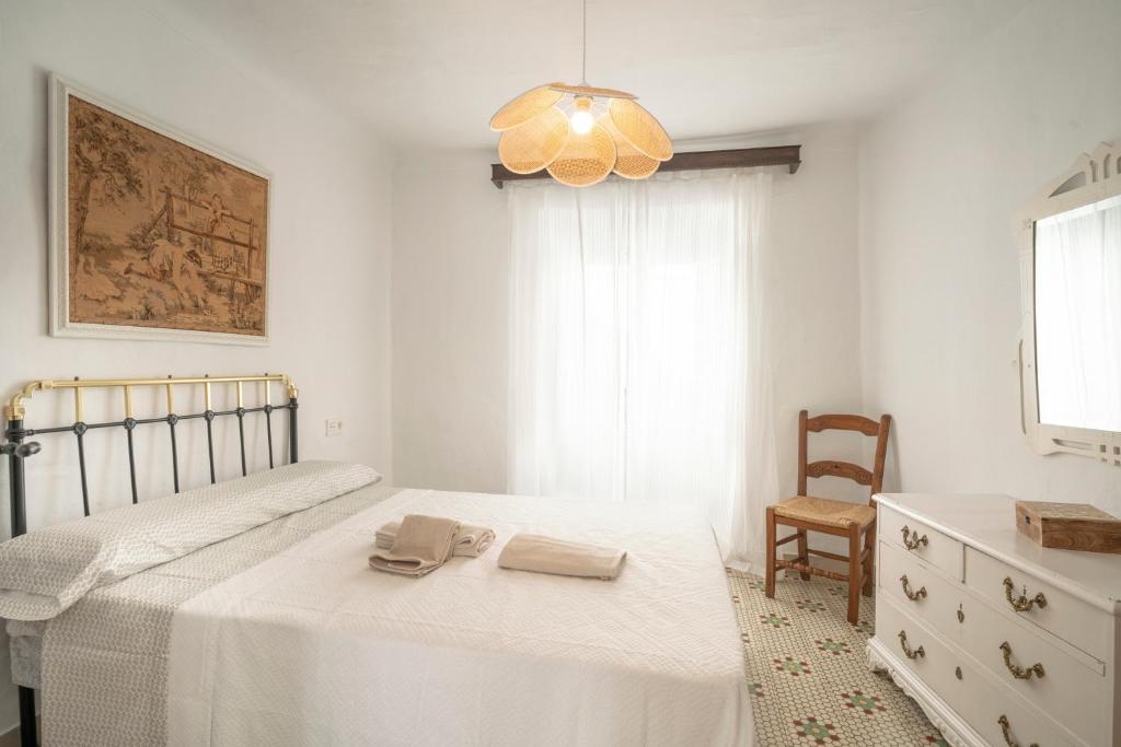 Postel nebo postele na pokoji v ubytování Casa Fernandez de Cordoba en Illora