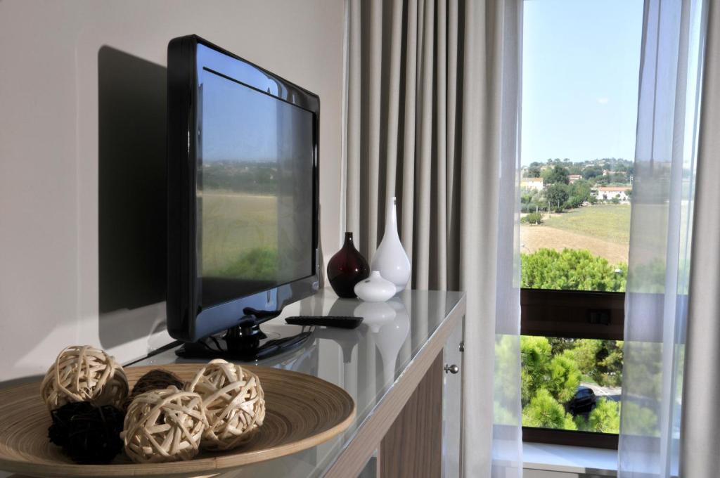 TV a/nebo společenská místnost v ubytování Hotel Federico II