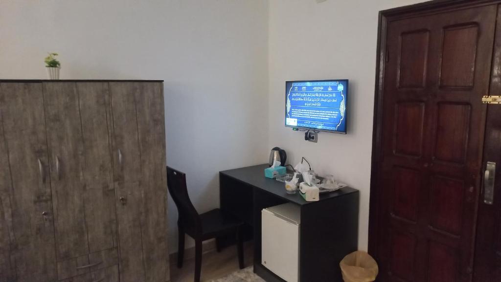 TV a/nebo společenská místnost v ubytování Malak Guest House