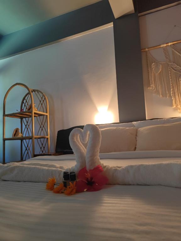 Postel nebo postele na pokoji v ubytování Daluyong Beach Resort