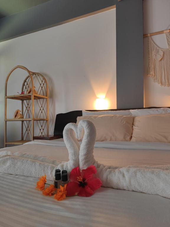 Postel nebo postele na pokoji v ubytování Daluyong Beach Resort