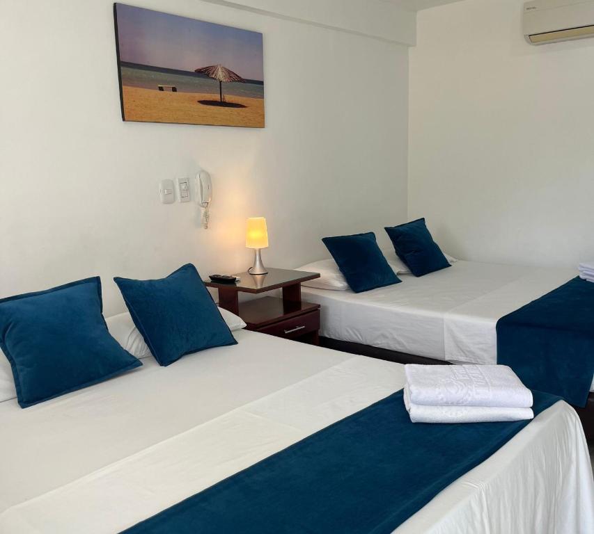 Postel nebo postele na pokoji v ubytování Hotel Tucuraca by DOT Tradition