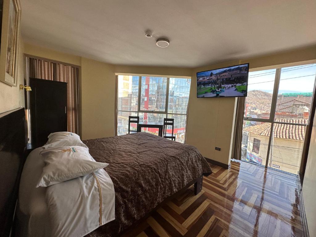 Ένα ή περισσότερα κρεβάτια σε δωμάτιο στο Hotel Inka Palace Huayna Ccapac Cusco