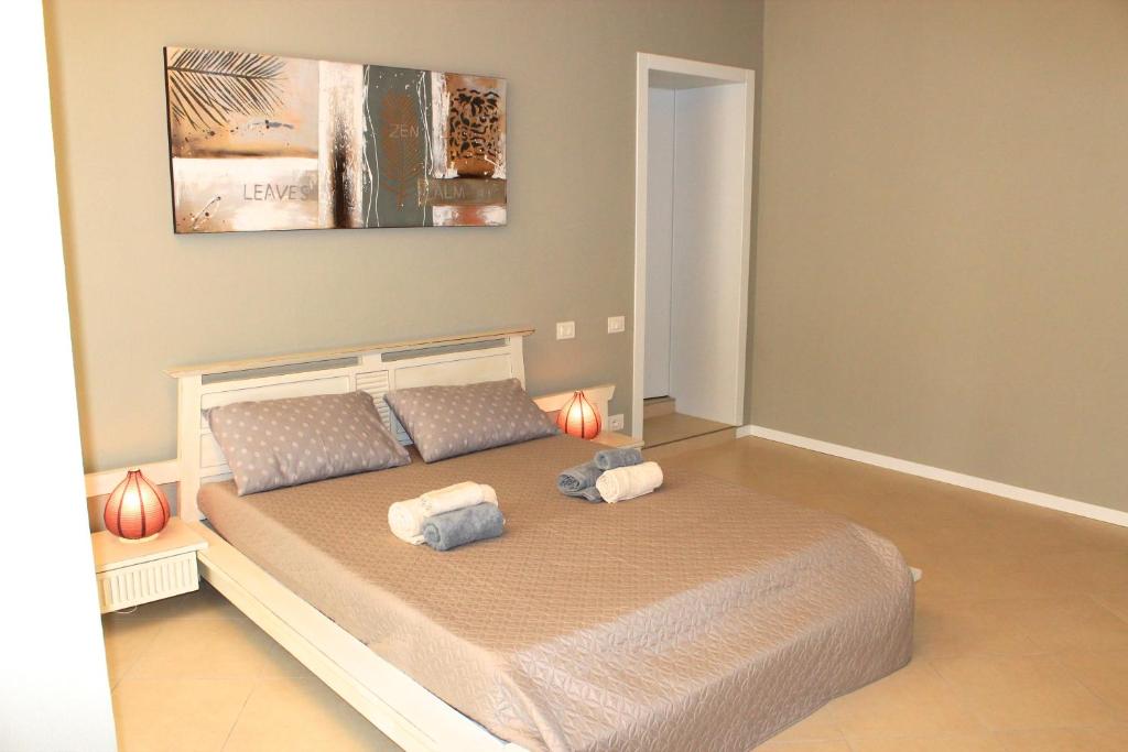 Postel nebo postele na pokoji v ubytování Residenza La Vecchia Vigna