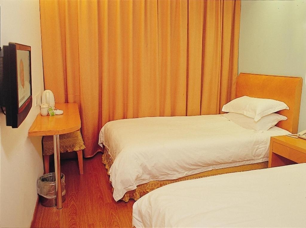 Postel nebo postele na pokoji v ubytování Jinjiang Inn - Shanghai Changning