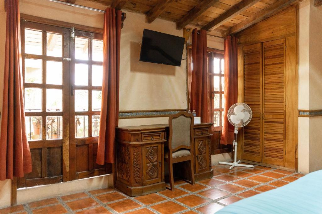 TV a/nebo společenská místnost v ubytování Hotel CasaMia