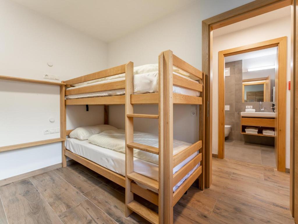 Posteľ alebo postele v izbe v ubytovaní Pinzgau Lodge 2B