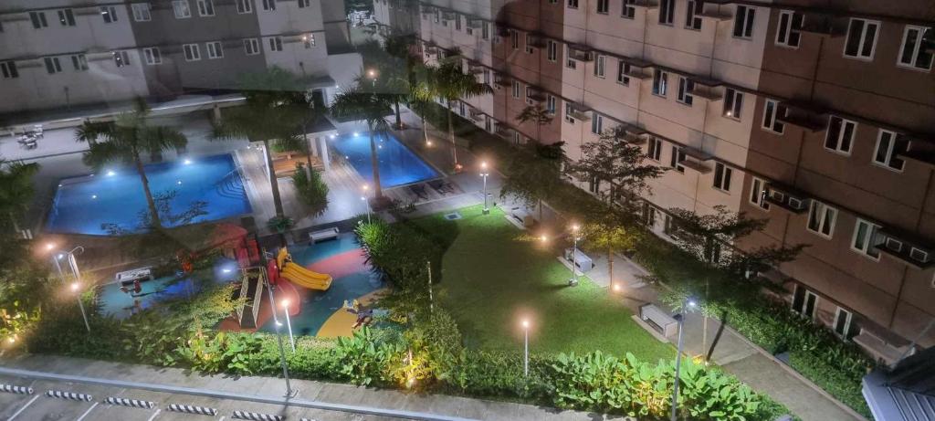 Bazén v ubytování Auberge Condotels at SMDC Hope Residences nebo v jeho okolí