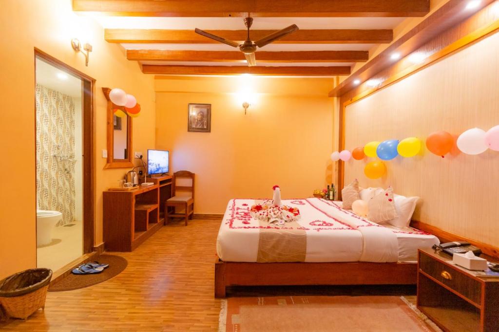 Letto o letti in una camera di Paradise Boutique Hotel