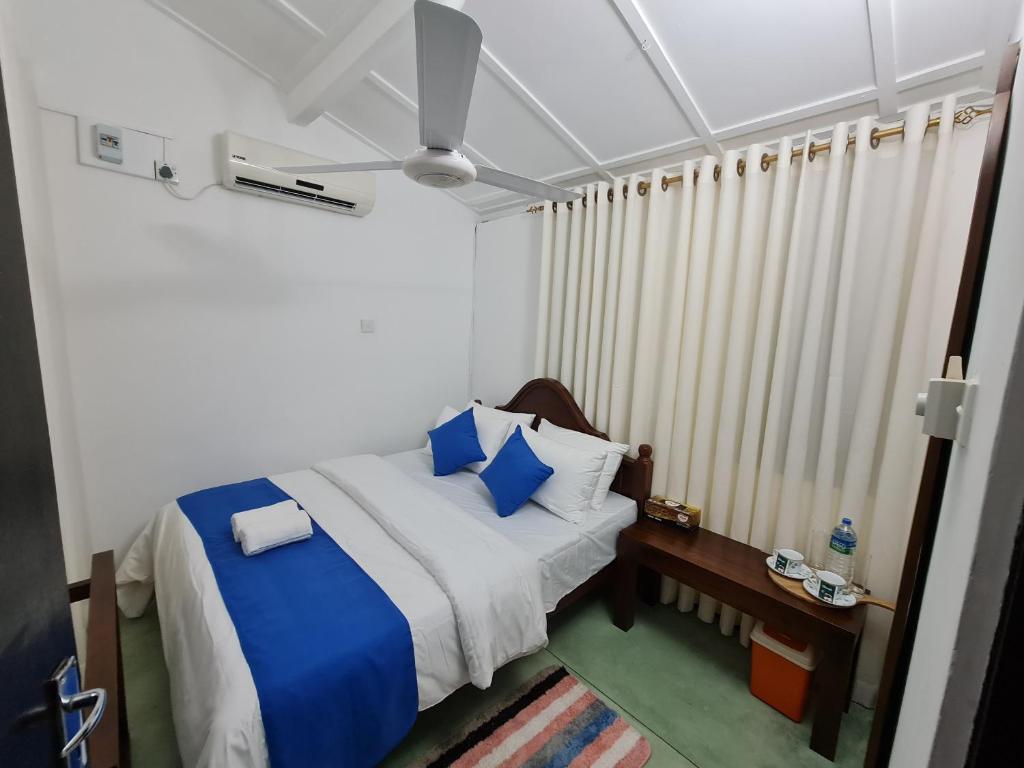 Postel nebo postele na pokoji v ubytování Hello Kandy Homestay