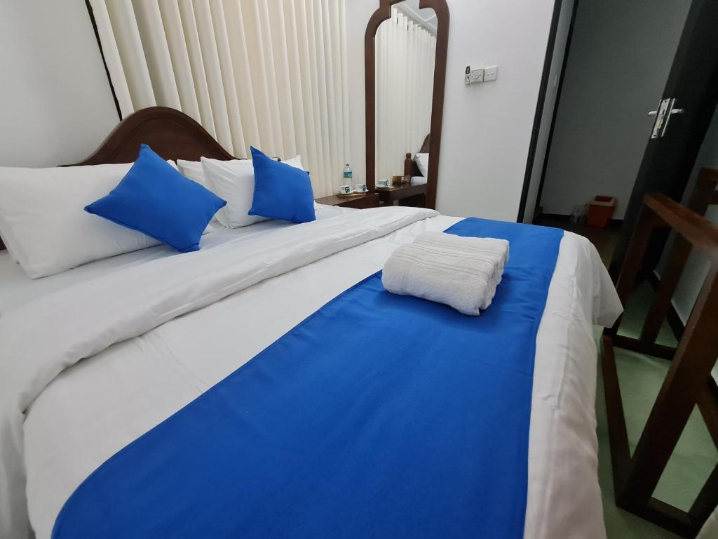 Postel nebo postele na pokoji v ubytování Hello Kandy Homestay