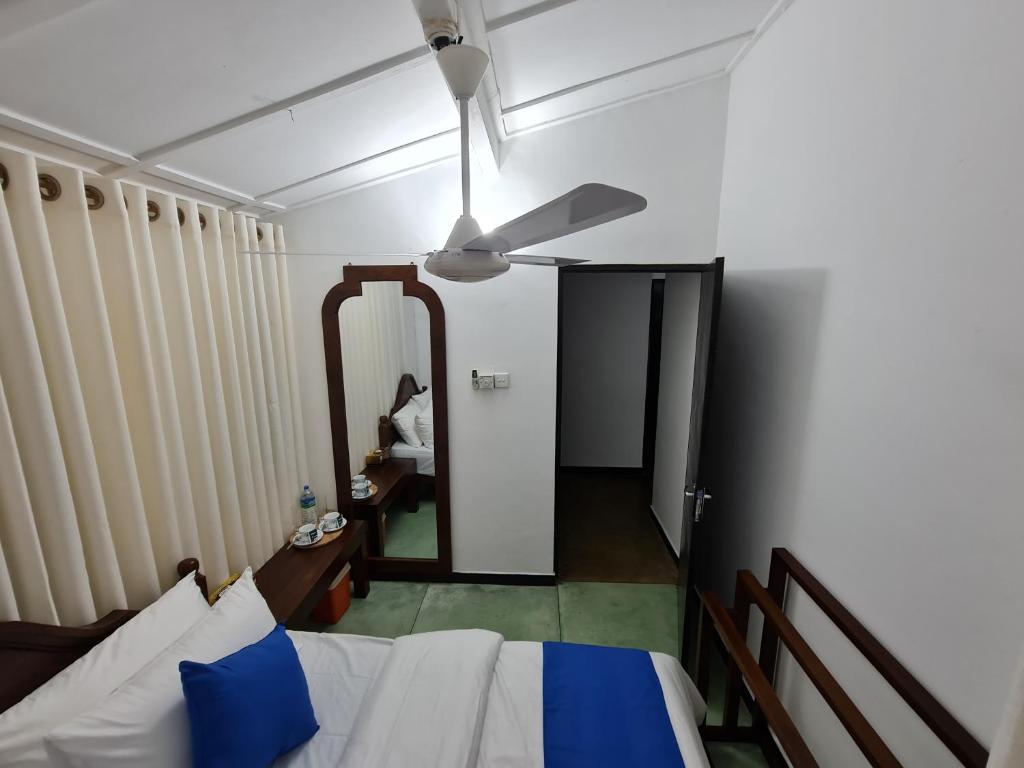 Postel nebo postele na pokoji v ubytování Hello Kandy Homestay
