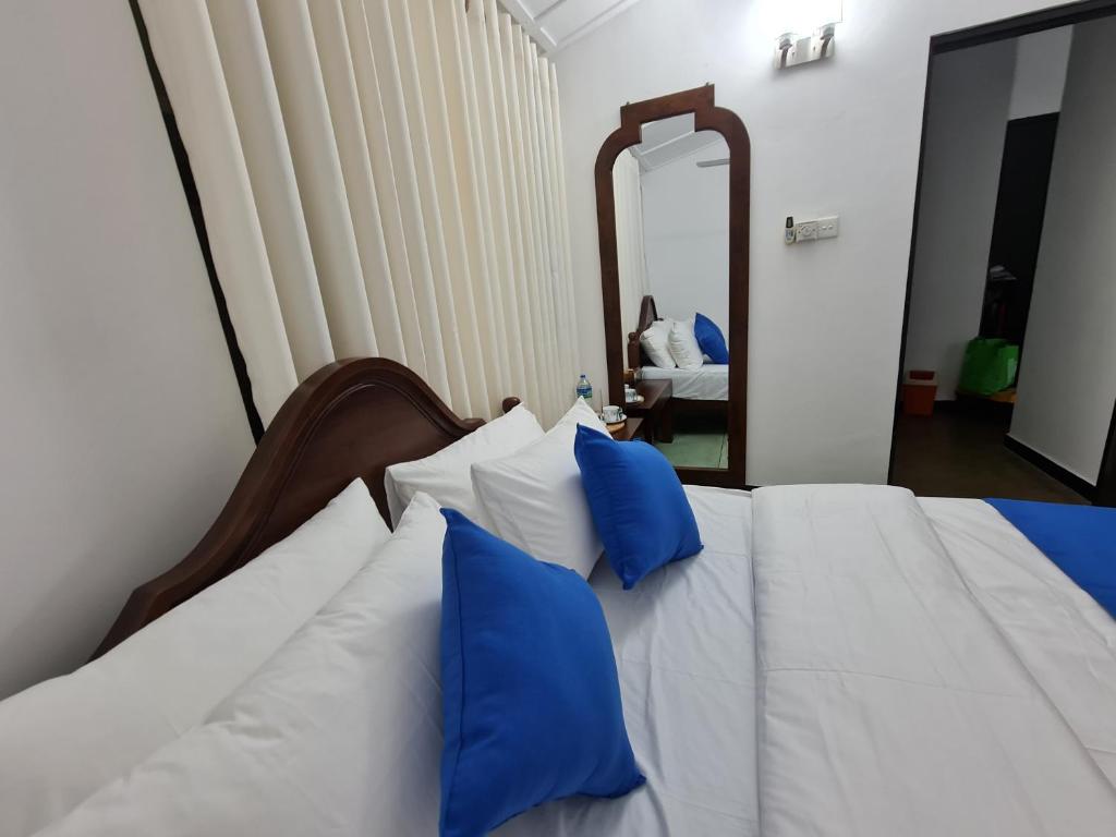 Postel nebo postele na pokoji v ubytování Hello Kandy Homestay