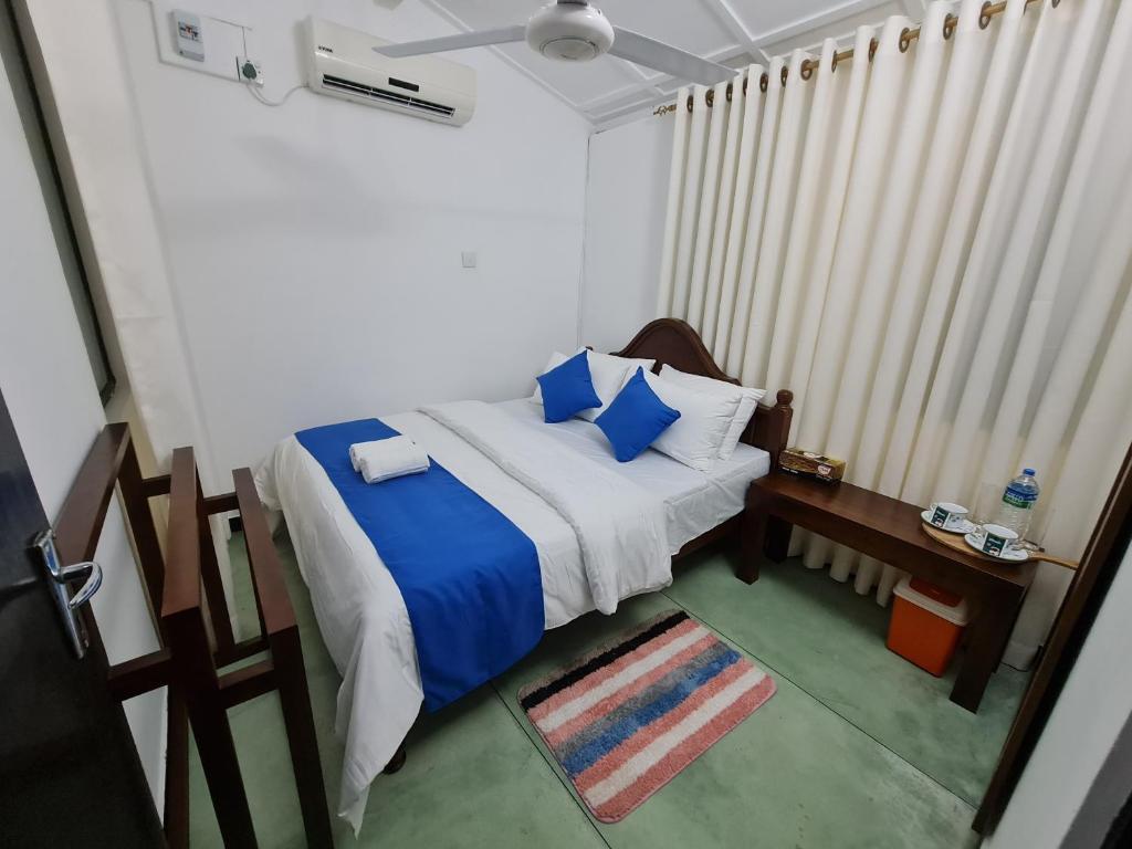Postel nebo postele na pokoji v ubytování Hello Kandy Homestay
