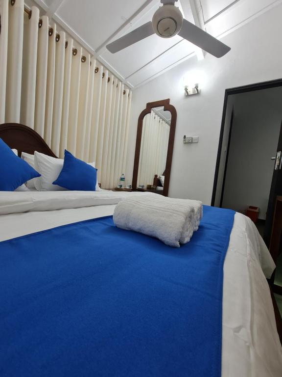Postel nebo postele na pokoji v ubytování Hello Kandy Homestay