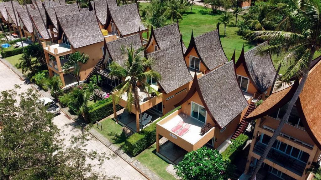 an aerial view of a resort with many roofs at Blue Heaven Bay Beach Room in Ko Chang