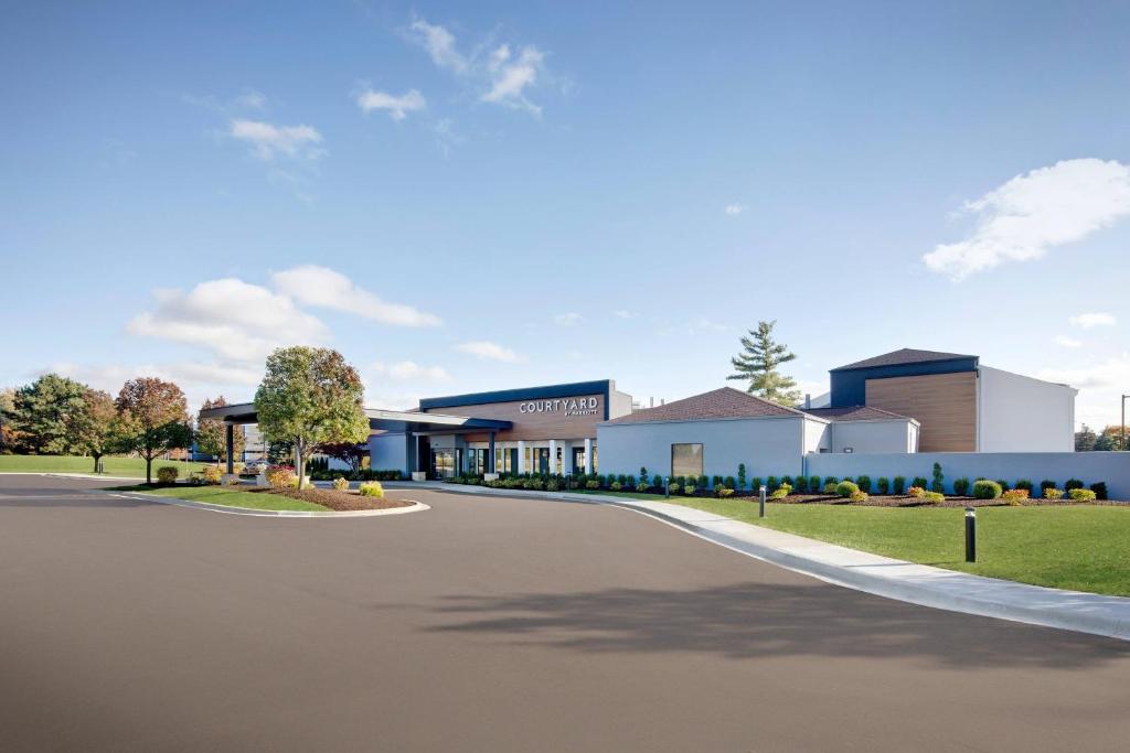 a road in front of a building at Courtyard Detroit Southfield in Southfield