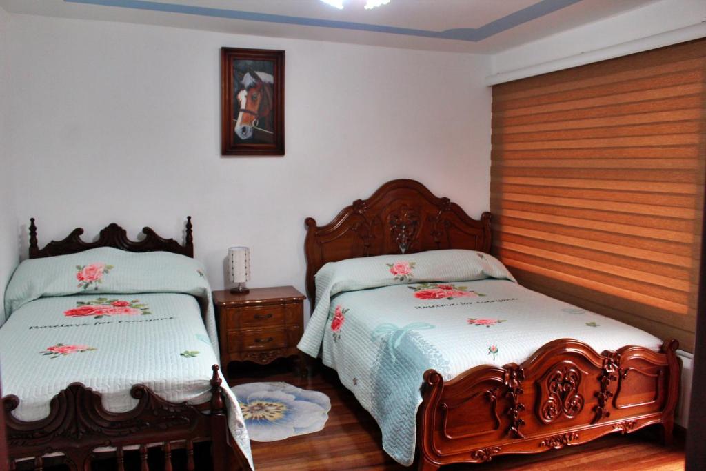Postel nebo postele na pokoji v ubytování Chaska Hotel