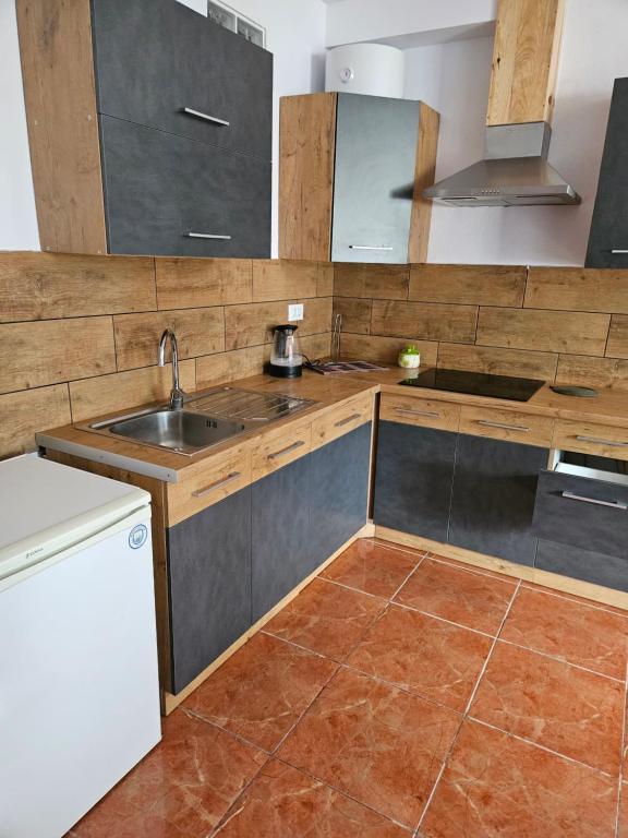Kuchyň nebo kuchyňský kout v ubytování Captain Morgan House