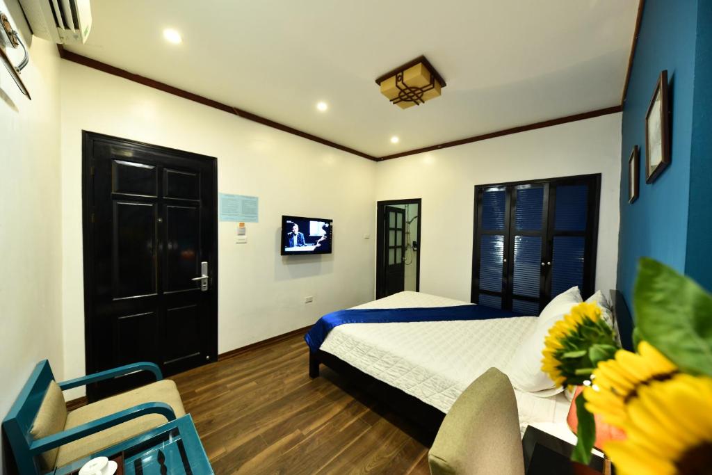 TV a/nebo společenská místnost v ubytování Hanoi Starlight Boutique Hotel