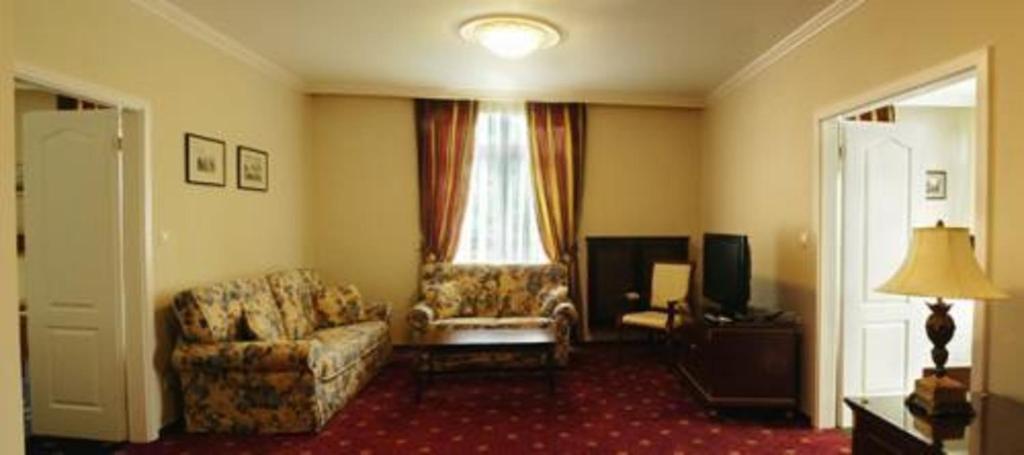 Posezení v ubytování Luxury Garni Hotel Brix