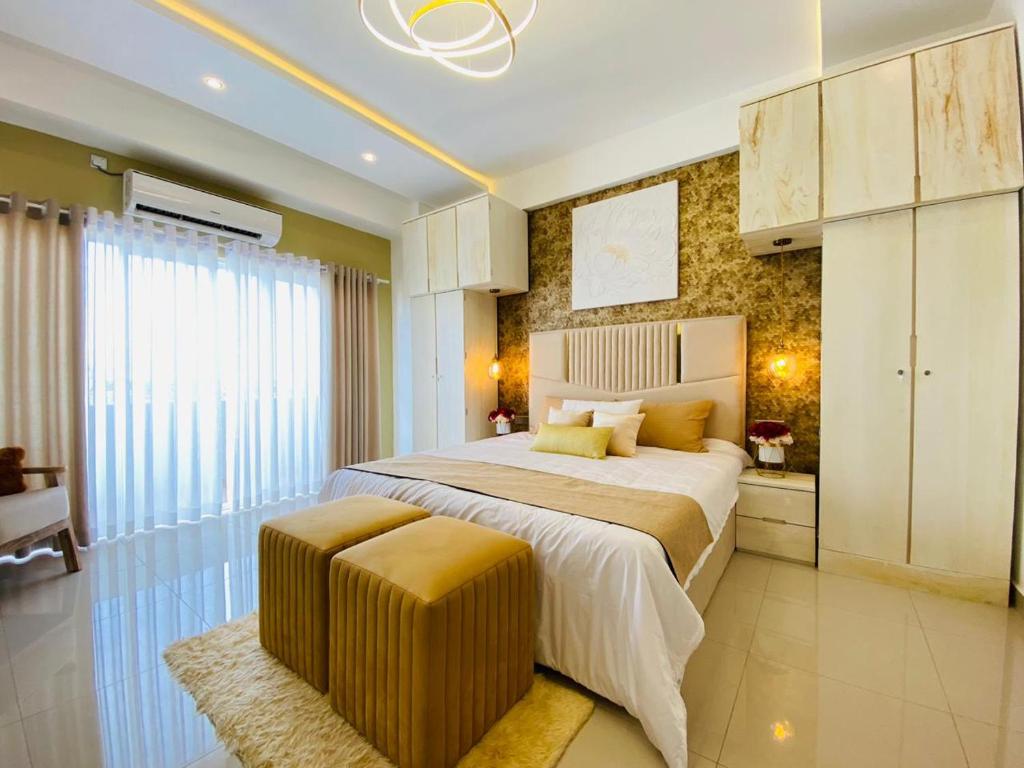 Ліжко або ліжка в номері Ocean Breeze - UDAYA Luxury Apartments