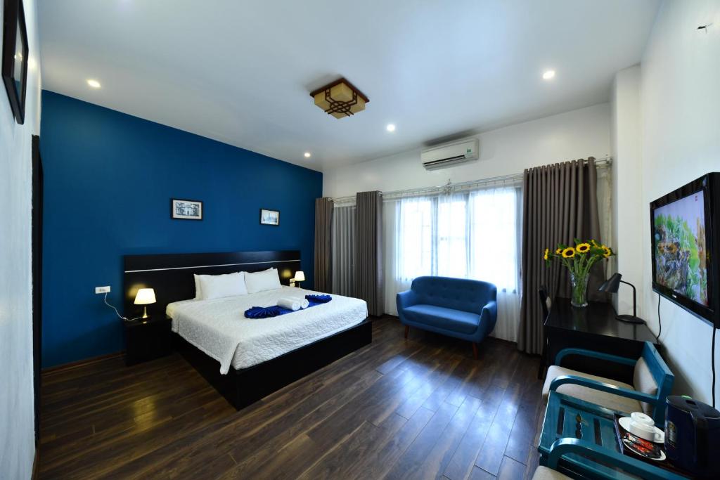 Giường trong phòng chung tại Hanoi Starlight Boutique Hotel
