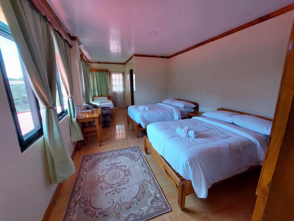 Postel nebo postele na pokoji v ubytování The Lalouette Inn