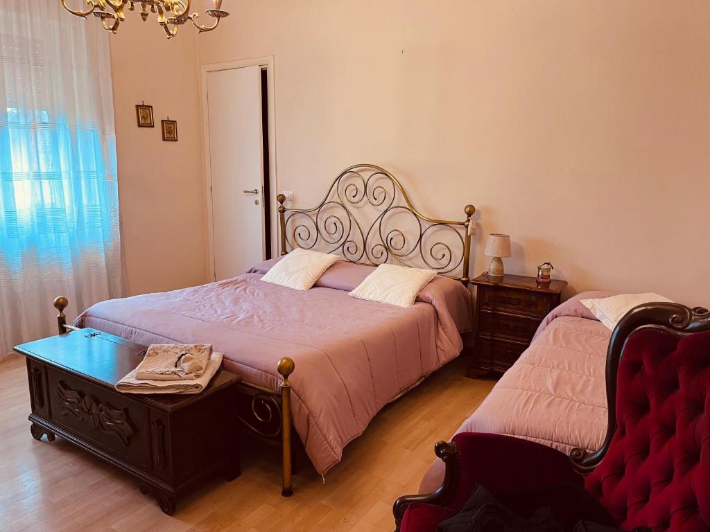 Postel nebo postele na pokoji v ubytování Bed&breakfast Benedetta