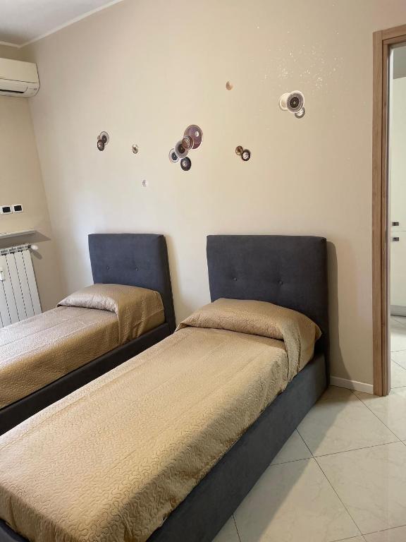 Postel nebo postele na pokoji v ubytování CASAMAGNOLIA