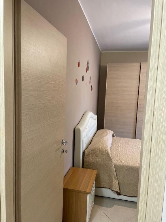 Postel nebo postele na pokoji v ubytování CASAMAGNOLIA