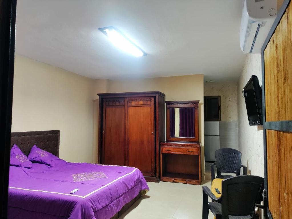 Postel nebo postele na pokoji v ubytování Sail Alhasa Tourist Resort-Tafila