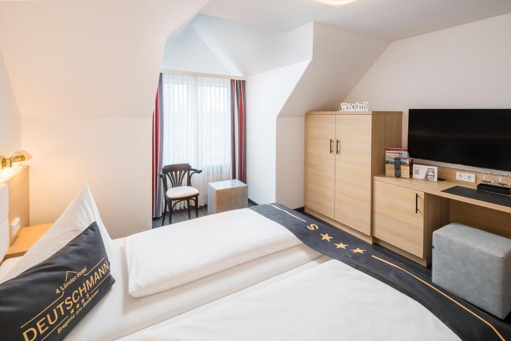Postel nebo postele na pokoji v ubytování 4-Länder-Hotel Deutschmann
