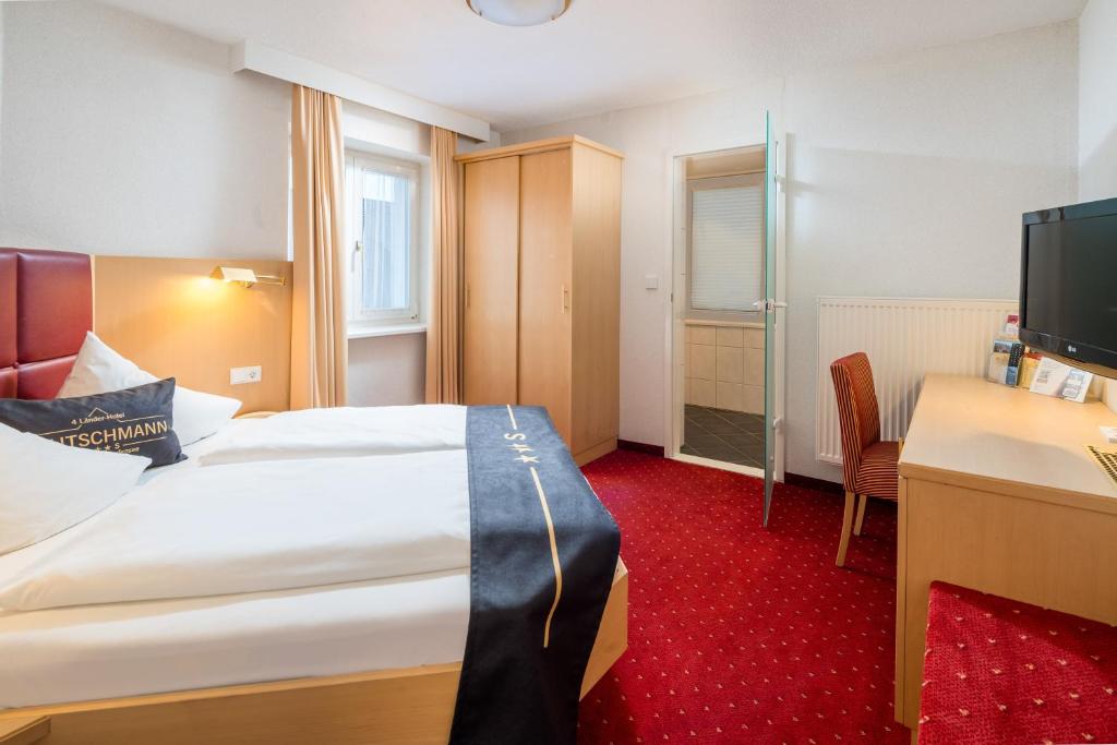 Postel nebo postele na pokoji v ubytování 4-Länder-Hotel Deutschmann