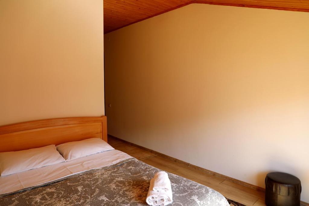 Llit o llits en una habitació de Nadia Guesthouse