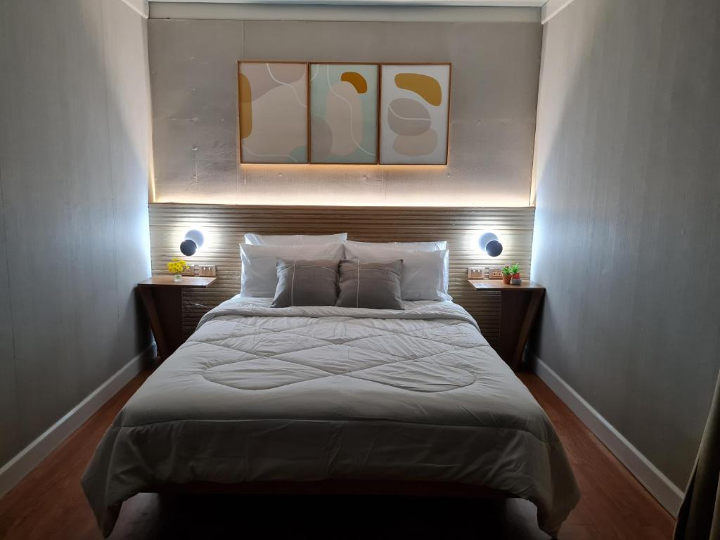 Postel nebo postele na pokoji v ubytování Ooni Hostel Moalboal
