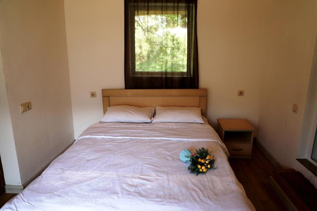 Llit o llits en una habitació de Nadia Guesthouse